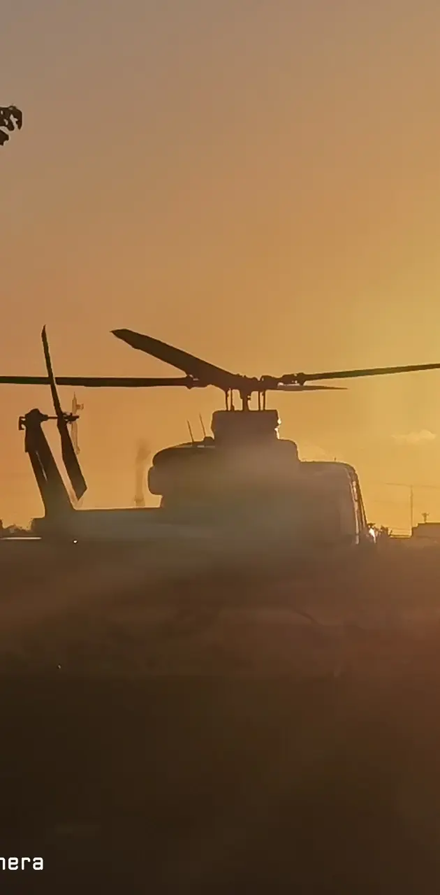 Helicopter and sunset