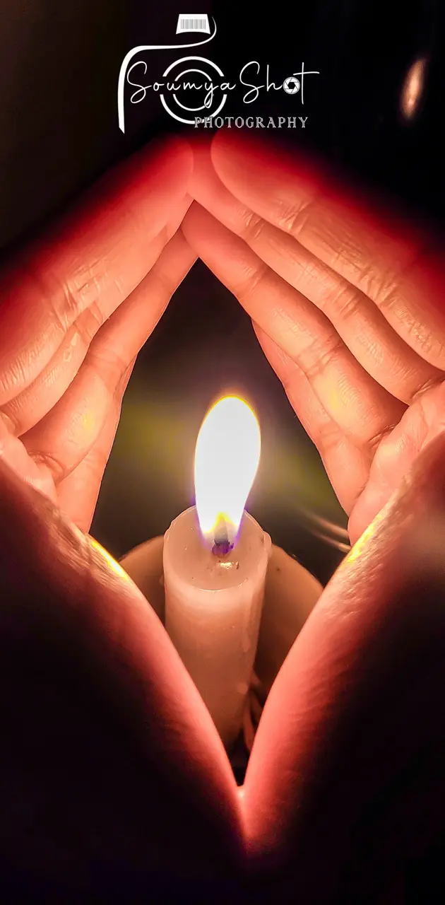 Candle inside Hand