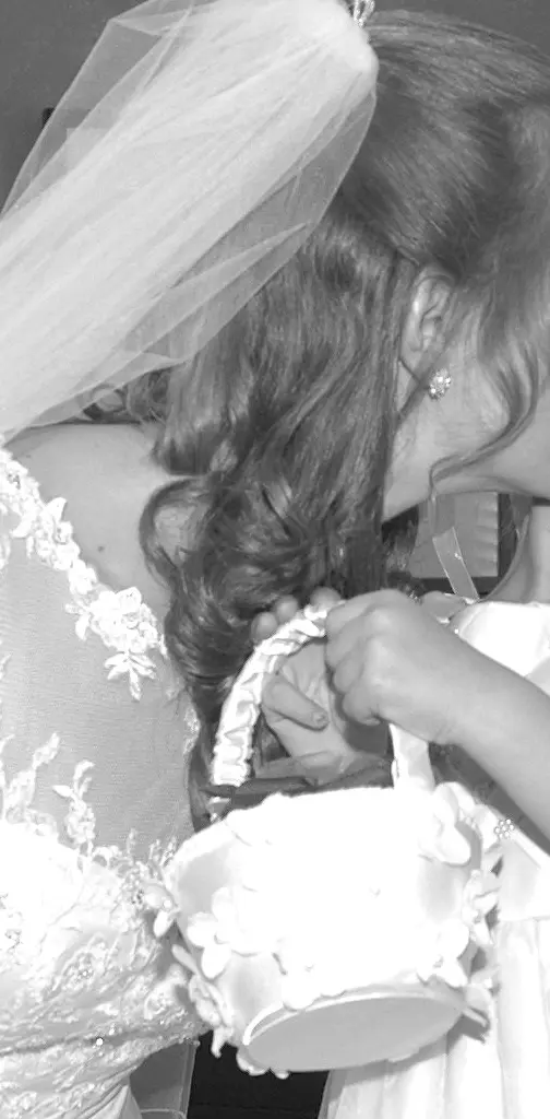 Bride kissing