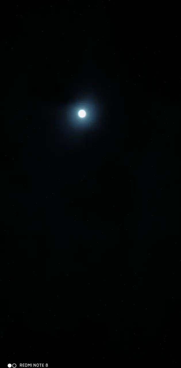 Moon in the dark sky