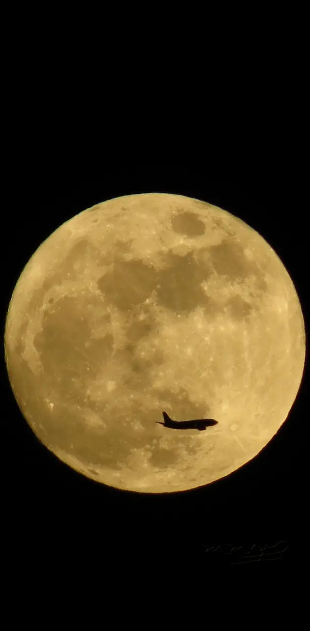 Moon and plane