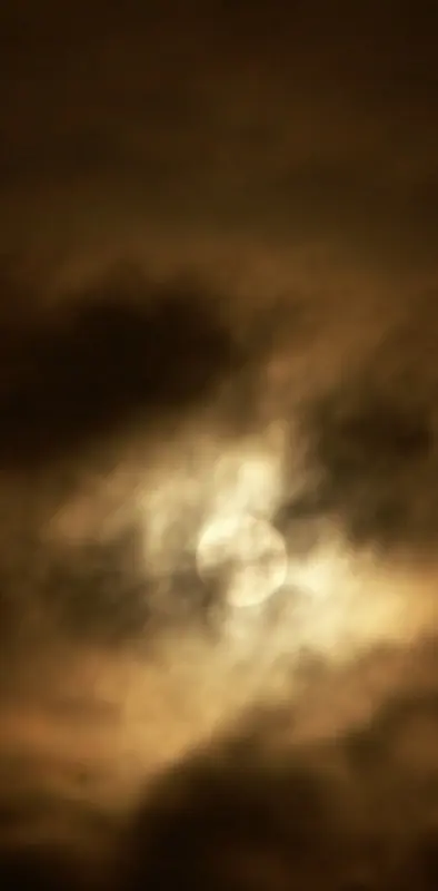 Moon Behind Clouds