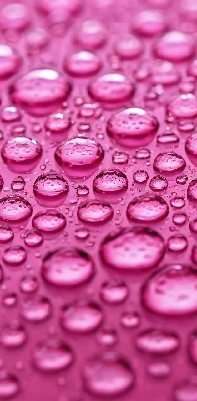 a close up of a pink surface