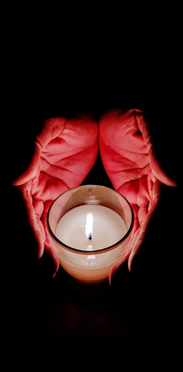 Candle in hands