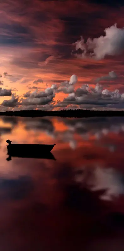 Boat At Sunset