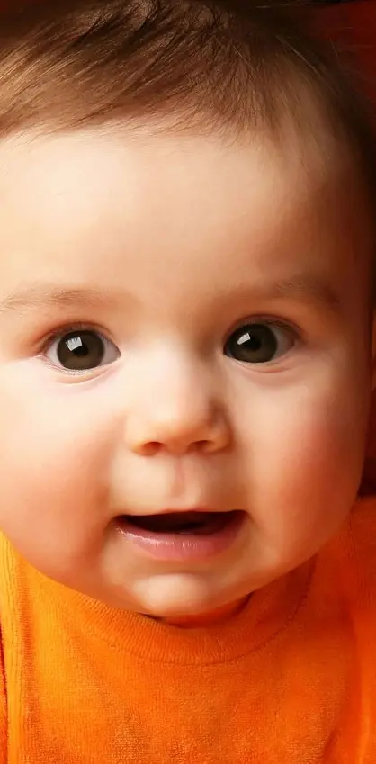 Cute Baby In Orange