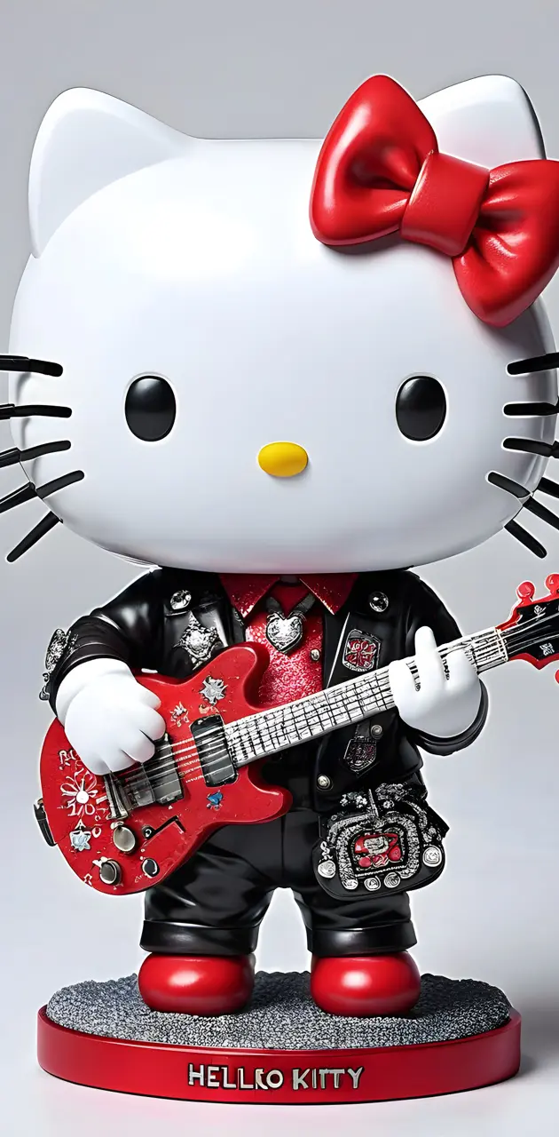 a toy cat with a guitar