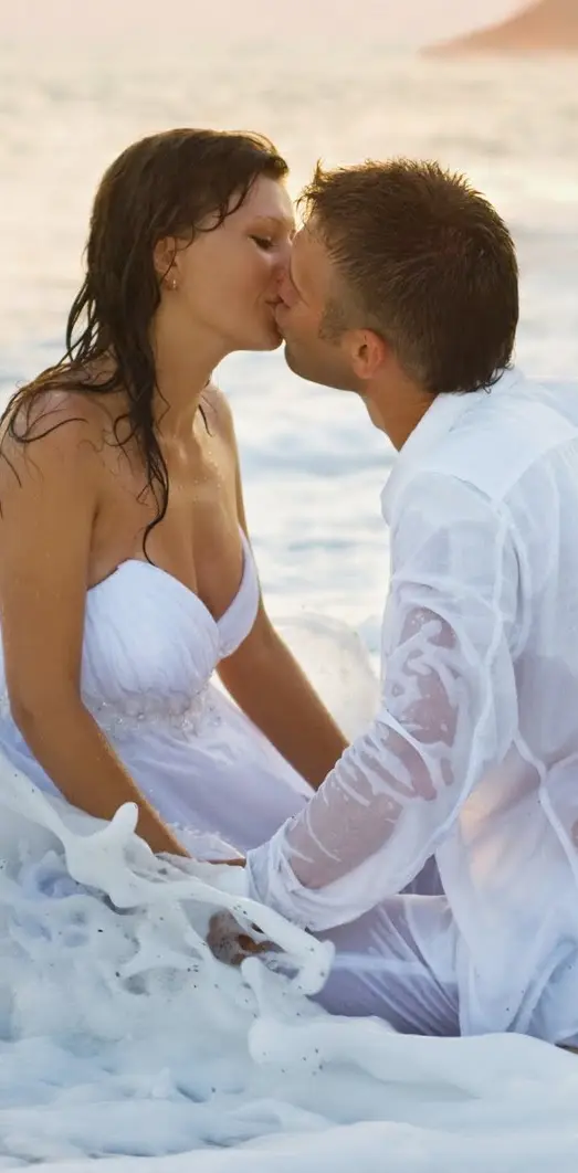 Couple Kiss In Beach