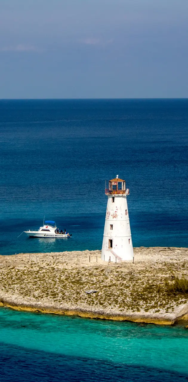 Lighthouse plus boat