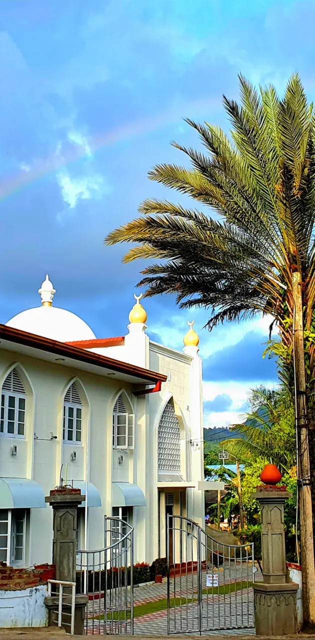 Mosque under rainbow