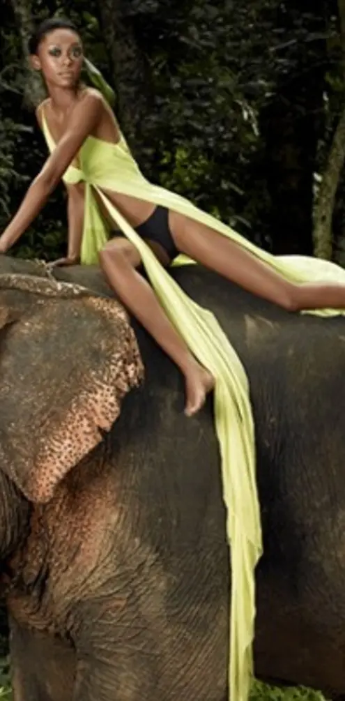 Girl Riding Elephant