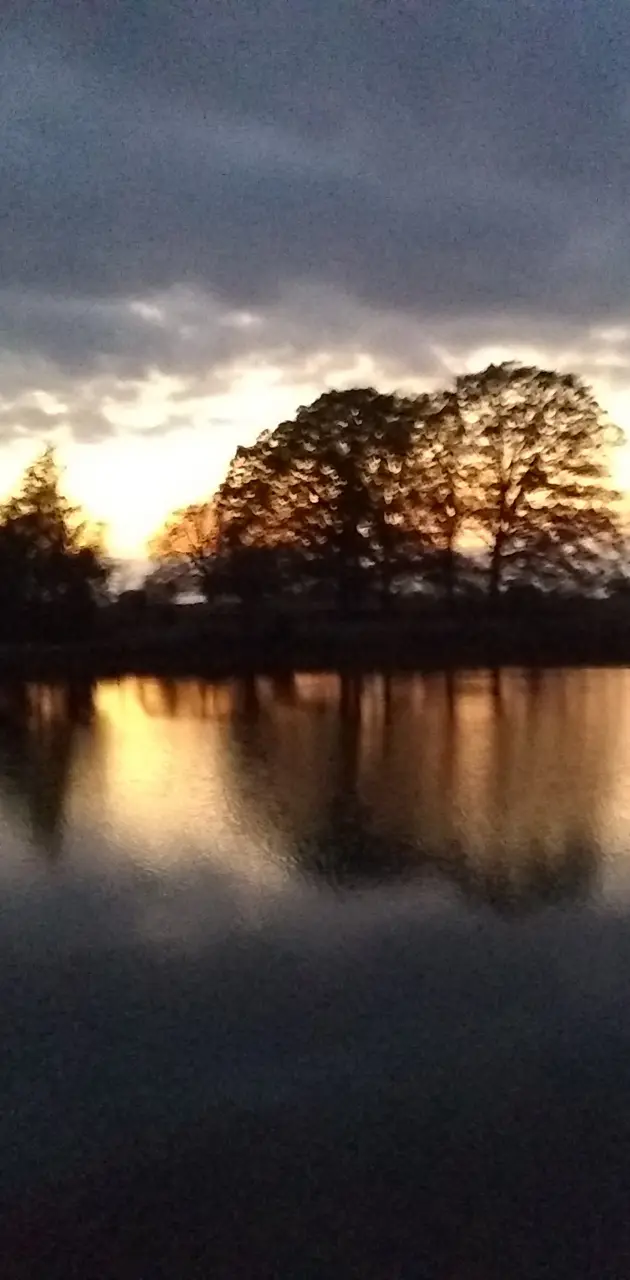 Sunset in pond